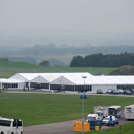A protestor is arrested during a demonstration against the The new terminal buit at Cardiff Airport specially for the NATO Summit which is taking place in Newport


© WALES NEWS SERVICE